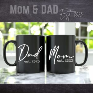 Pregnancy Gift Est 2023 - New Mommy and Daddy Est 2023 11 oz Black Mug Set with "And So The Adventure Begin" Romper (0-3 Months) - Top Mom and Dad Gift Set for New and Expecting Parents to Be