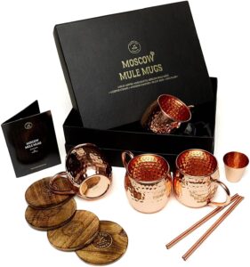 moscow mule copper mugs set - 4 authentic handcrafted copper mugs (16 oz.) with 2 oz. shot glass, 4 straws, 4 solid wood coasters and recipe book - gift box included