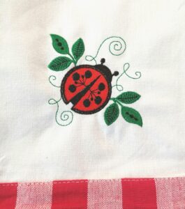 embroidered kitchen towel, ladybug with leave red check