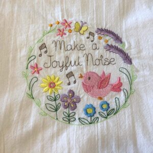 Make a Joyful Noise embroidered tea towel, bird and flowers in wreath, machine embroidery on flour sack dish towel