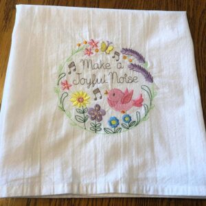 Make a Joyful Noise embroidered tea towel, bird and flowers in wreath, machine embroidery on flour sack dish towel