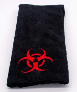 embroidered biohazard symbol hand towel - plush and absorbent