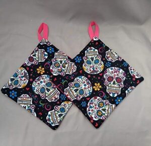 potholder set in a pop sugar skull fabric print by sewuseful studios