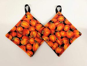 potholder set in a fall pumpkin fabric print by sewuseful studios llc