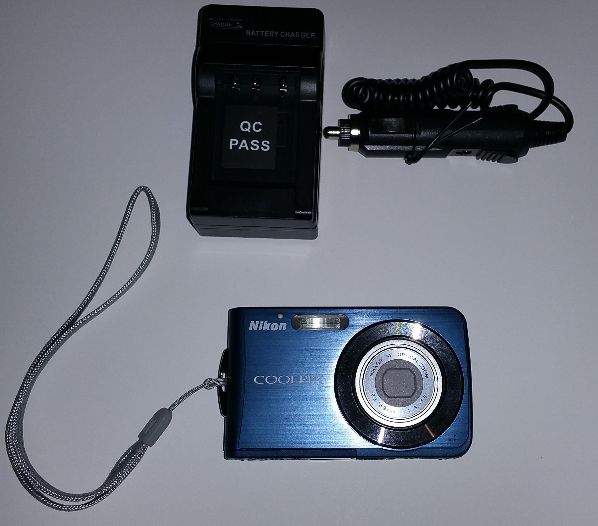 Nikon Coolpix S210 8MP Digital Camera with 3x Optical Zoom (Cool Blue)