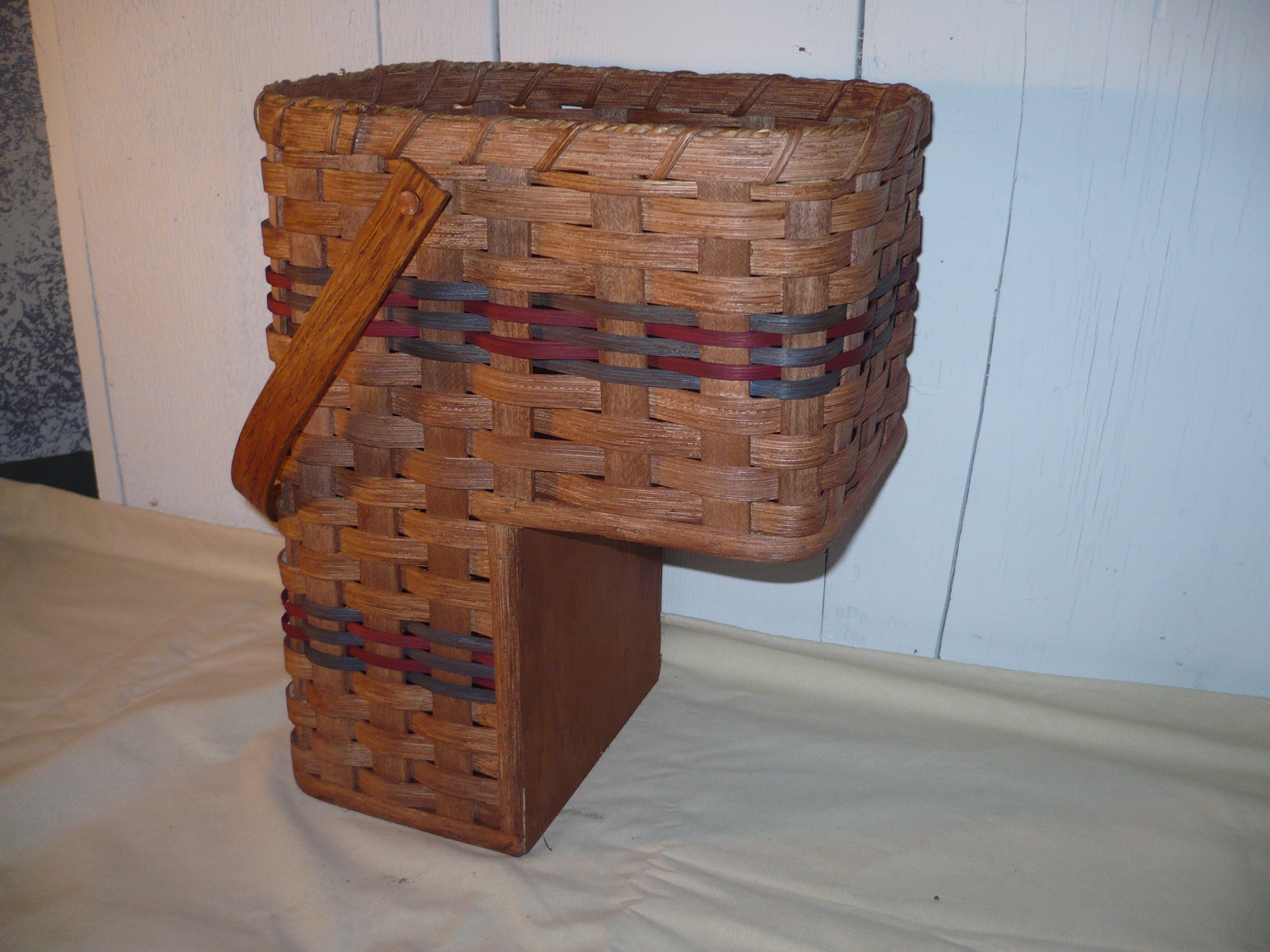 Amish Handmade Stair Step Basket (Small). This Handmade Basket Enhances Any Country Home Decor and Also Makes Carrying Items up and Down the Stairs Easier. You Will Love It! Measures: Top Opening 12" X 9" - 14.5" High - 7" From Bottom of Basket to Bottom