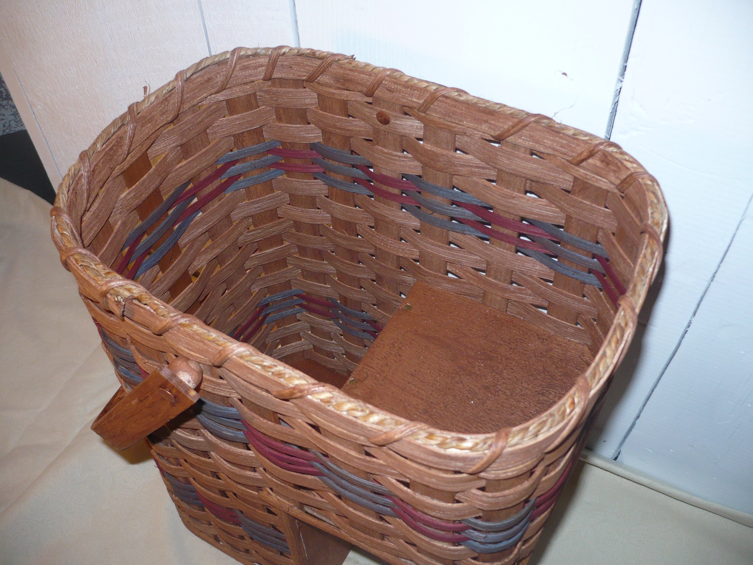 Amish Handmade Stair Step Basket (Small). This Handmade Basket Enhances Any Country Home Decor and Also Makes Carrying Items up and Down the Stairs Easier. You Will Love It! Measures: Top Opening 12" X 9" - 14.5" High - 7" From Bottom of Basket to Bottom