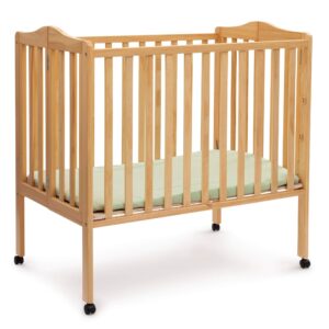 delta children folding portable mini baby crib with 1.5-inch mattress - greenguard gold certified, natural