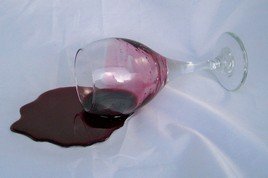 fake glass of spilled wine