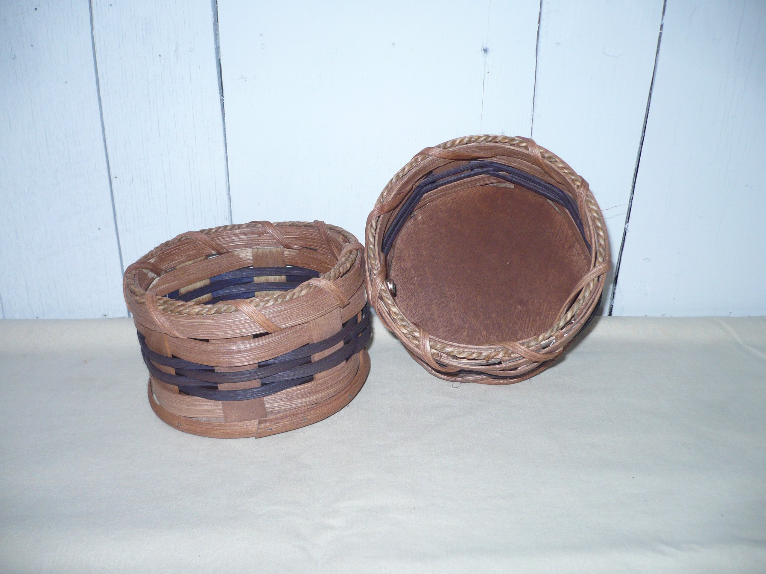 Handmade Small Peanut Basket. This Handmade Basket Was Designed to Put Nuts in One Side and Empty the Shells in the Other Side. It Makes a Very Unique Gift. Colors May Vary (Black, Red, Blue, Green, Burgundy, Natural) Measures 5" Round X 3" Tall for Each