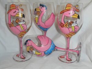 hand painted beach flamingos. set of 4. 2 male and 2 female.