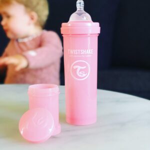 Twistshake Anti Colic Baby Bottles - Premium 330ml/11oz Bottles with 100ml Milk Storage Container for a Comfortable Feeding Experience for Baby Care - Pastel Pink