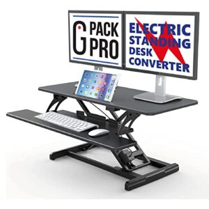 g pack pro standing desk converter - electric height adjustable desk for sit stand desk workstation with removable keyword tray and space for dual monitors - ergonomic design for maximum productivity