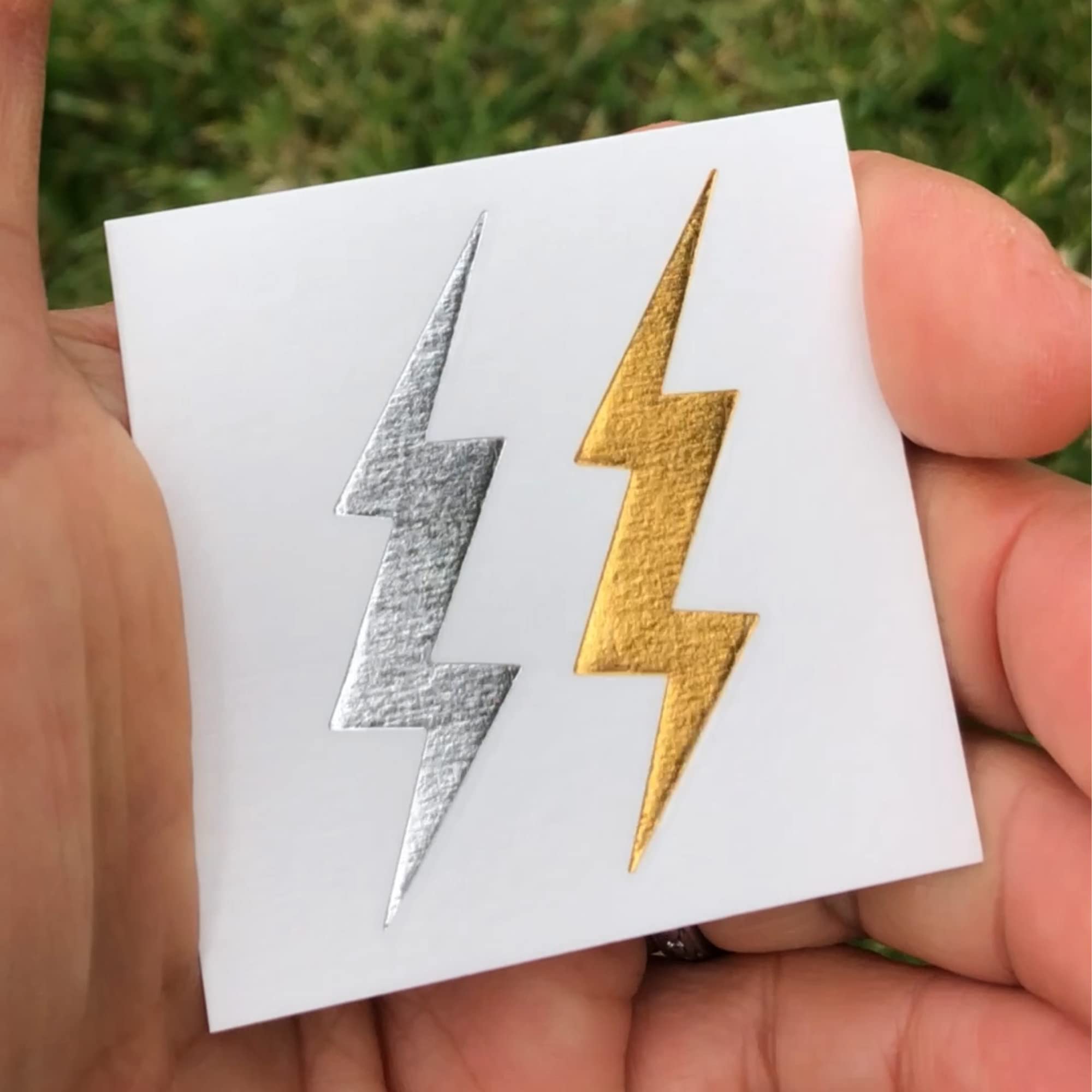 FashionTats Metallic Lightning Bolt Temporary Tattoos | 20-Pack | Silver & Gold Metallic | Skin Safe | Made in The USA | Removable (20 Count (Pack of 1), 1, Count)