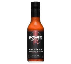 black garlic and carolina reaper hot sauce by bravado spice featured on hot ones gluten free, vegan, low carb, paleo all natural 5 oz bottle award winning gourmet hot sauce