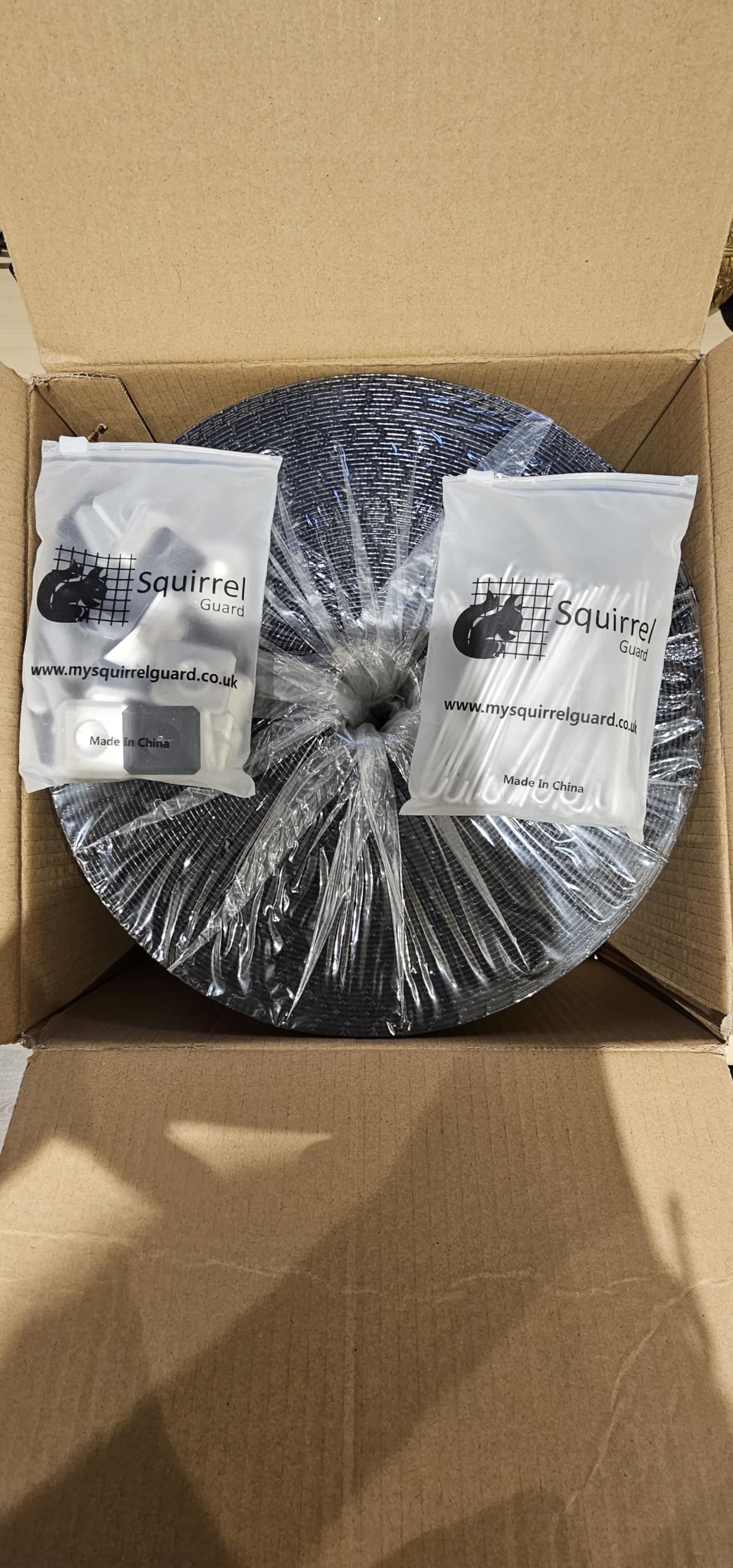 Squirrel Guard 8" Kit. 100 ft. PVC Coated Galvanized Steel Roll with 100 Aluminum Fasteners