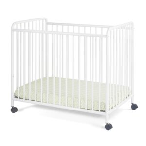 Child Craft Siesta Metal Compact Non-Folding Portable Crib with 2” Crib Mattress and Locking Wheels, Durable Metal Construction, Easy to Clean (White)