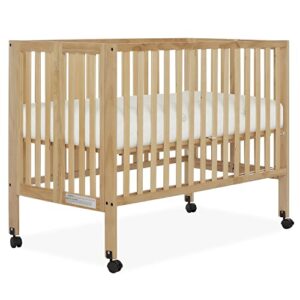 dream on me quinn full-size folding crib in natural, removeable wheels, modern nursey, adjustable mattress support, portable crib, patented folding system