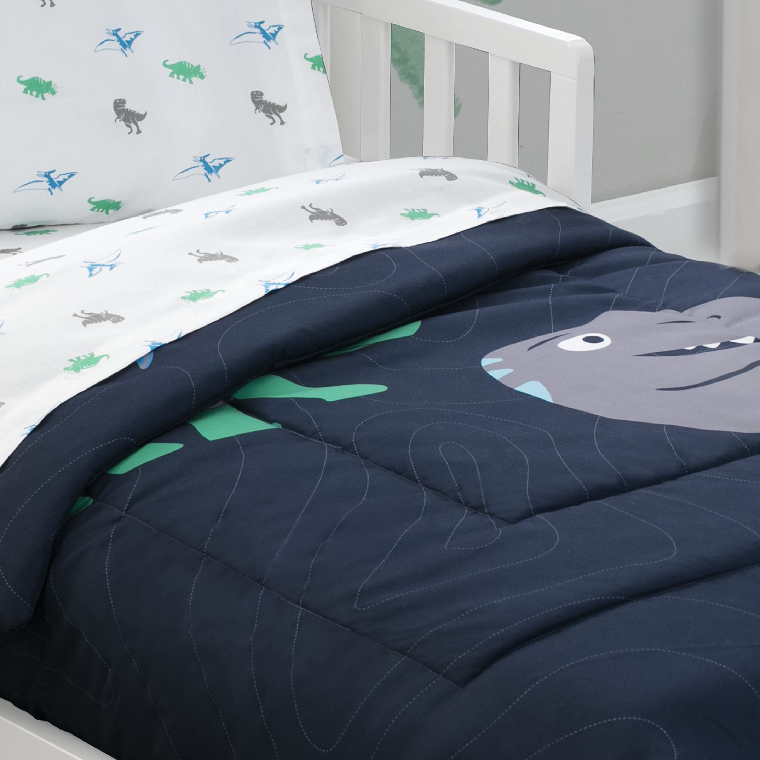 Delta Children 4 Piece Toddler Bedding Set for Boys - Reversible 2-in-1 Comforter - Includes Fitted Comforter to Keep Little Ones Snug, Bottom Sheet, Top Sheet, Pillow Case - Jurassic Dinosaur