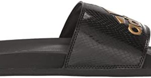 adidas Women's Adilette Comfort Slides Sandal, Black/Gold Metallic/Black, 7