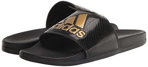 adidas Women's Adilette Comfort Slides Sandal, Black/Gold Metallic/Black, 7