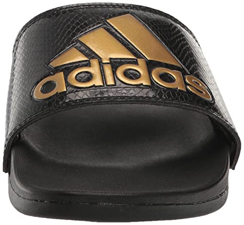 adidas Women's Adilette Comfort Slides Sandal, Black/Gold Metallic/Black, 7