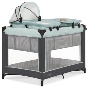 dream on me lilly deluxe-playard in green bay with full bassinet, changing tray and infant bassinet | with canopy | waterproof fabric | jpma certified | lightweight