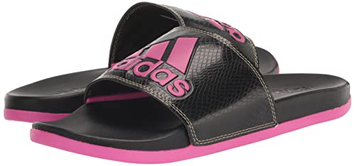 adidas Women's Adilette Comfort Slides Sandal, Black/Lucid Fuchsia/Gold Metallic, 7