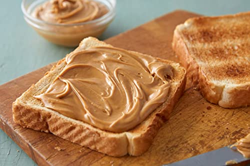 Peter Pan Creamy Peanut Butter, Made with Roasted Peanuts, Great for Peanut Butter and Jelly Sandwiches and Peanut Butter Snacks, Gluten Free Peanut Butter, 16.3 OZ Jar (Pack of 12)