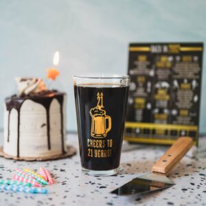 Greenline Goods Happy Birthday Beer Pint Glass (16 oz) & 2002 Birthday Year Facts Board Set with Stand Included - 21st Birthday for Men and Women - Cheers to 21 Years!