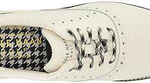 Cole Haan Women's Originalgrand Shortwing Golf Sneaker, Ivory/Black/Ivory, 8.5