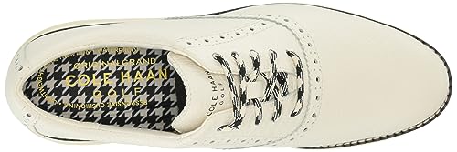 Cole Haan Women's Originalgrand Shortwing Golf Sneaker, Ivory/Black/Ivory, 8.5