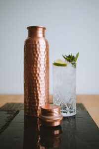 ava designz cleo home | (32 oz/950 ml) 100% ayurvedic pure copper handcrafted water bottle | lab-tested, leak-proof copper vessel | drink more water and enjoy the health benefits immediately