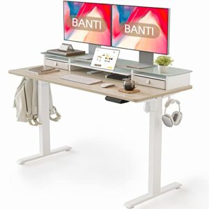 banti 55"x 26" electric standing desk with glass top monitor stand, adjustable sit stand up table with double drawer, sit stand desk with storage shelf, light walnut top