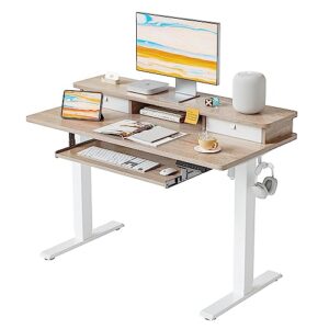 fezibo standing desk with drawers, adjustable height desk with keyboard tray, stand up desk with storage shelf, 48 x 24 inchs, maple top