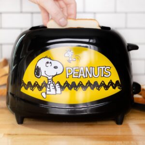 uncanny brands peanuts snoopy two-slice toaster- toasts your favorite beagle on your toast