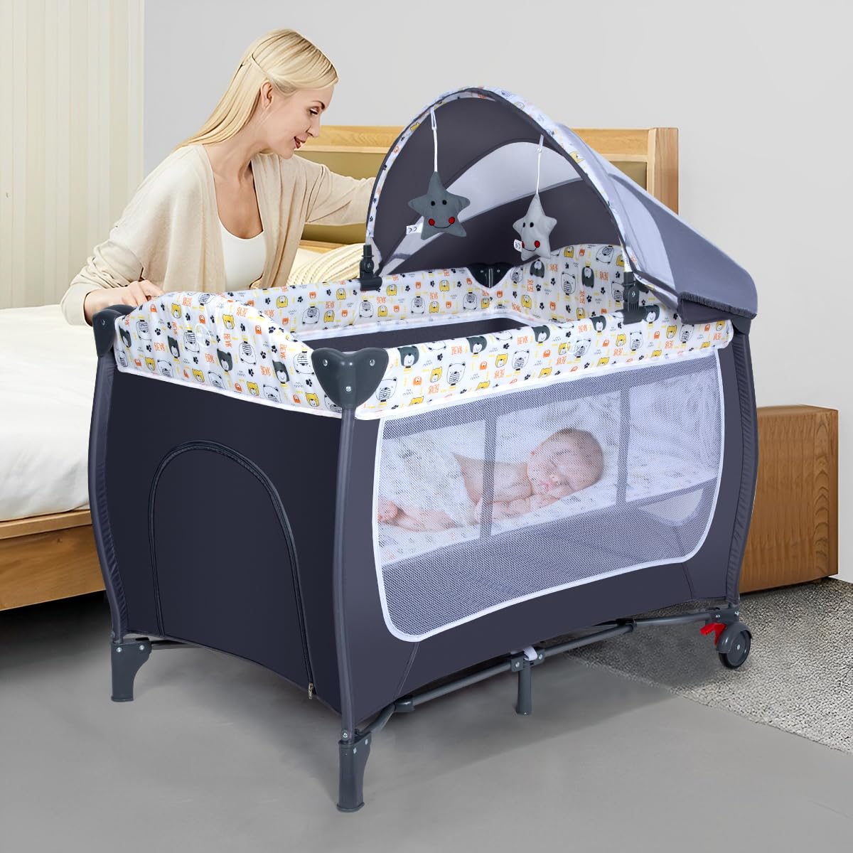 ANNA QUEEN 4 in 1 Pack and Play,Portable Baby Nursery Center Baby Playard, Foldable Baby Crib with Changing Table & Wheels,Removable Canopy with Toys,Storage Bag (Grey)