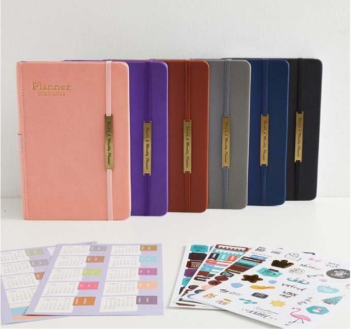 Leather Hardcover Planner 2023-2024, Weekly and Monthly Planner, Jul.2023-Dec 2024, A5 size 5.5 x 8 inch, Includes: Planner stickers + Monthly tab and Bookmarks + Inner Pocket + Elastic Closure + Pen