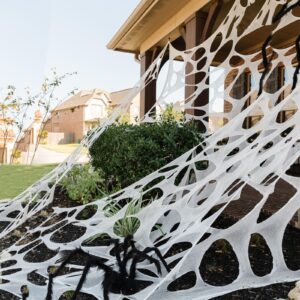 anygift diy halloween spider web cloth decorations,10 x 5.33ft stretchy spiderweb for halloween, spooky giant spider web decorations for outside house halloween outdoor decor(white)