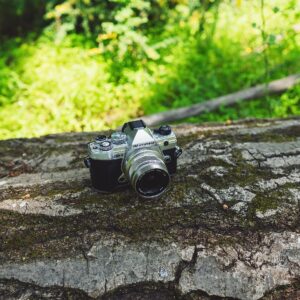 Bundle of OM System OM-5 Silver Outdoor Camera Weather Sealed Design 5-Axis Image Stabilization 50MP Handheld High Res Shot + M.Zuiko Digital ED 12mm F2.0 Silver