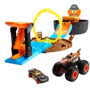 hot wheels monster trucks stunt tire play set opens to reveal arena with launcher, 1 1:64 scale car & 1 monster truck, portable toy gift set for ages 4 to 8 years old, black