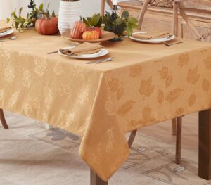 newbridge tremont leaf damask, fabric tablecloth, swirling leaves damask, print, soil resistant, easy care tablecloth, 60 inch x 144 inch rectangle, gold
