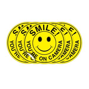 (set of 5) smile you're on camera sign - 4.5" circle - 4 mil vinyl - laminated for ultimate protection & durability - self adhesive decal - uv protected & weatherproof - heavy duty