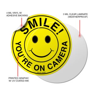 (Set of 5) Smile You're On Camera Sign - 4.5" Circle - 4 Mil Vinyl - Laminated for Ultimate Protection & Durability - Self Adhesive Decal - UV Protected & Weatherproof - Heavy Duty