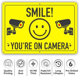 ASSURED SIGNS Smile You're On Camera Sign - 11.75 X 8 Inch - 2 Pack - Ideal Aluminum Video Surveillance Security Signs to Prevent Trespassing on Private Property - Perfect for House, Business, Yard or Private Driveway