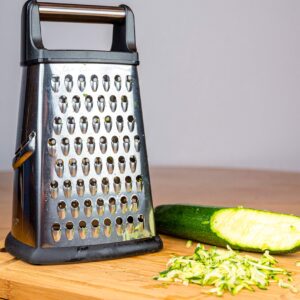 4-Sided Cheese Grater Stainless Steel with Strong Grip and Sharp Blades Professional Box Design with Perfect Slicer, Shredder & Zester For Fruits, Vegetables, Cheeses, Carrot Etc.