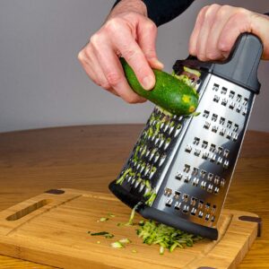 4-Sided Cheese Grater Stainless Steel with Strong Grip and Sharp Blades Professional Box Design with Perfect Slicer, Shredder & Zester For Fruits, Vegetables, Cheeses, Carrot Etc.