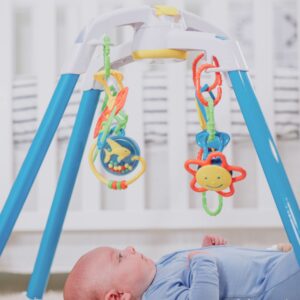 nurture smart - baby play gym - interactive infant play gym, safely fit in crib - with cause and effect hanging toys that stimulate brain & muscle development - developmental toy