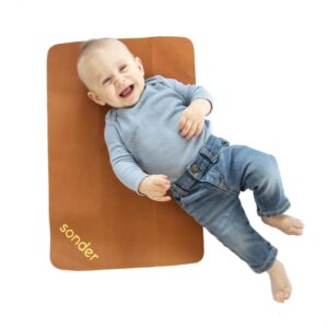sonder double sided vegan leather changing mat - infant and toddler multipurpose portable waterproof diaper pad - compact for travel - deluxe diaper changer (14" x 22", sugar almond + honey gold)