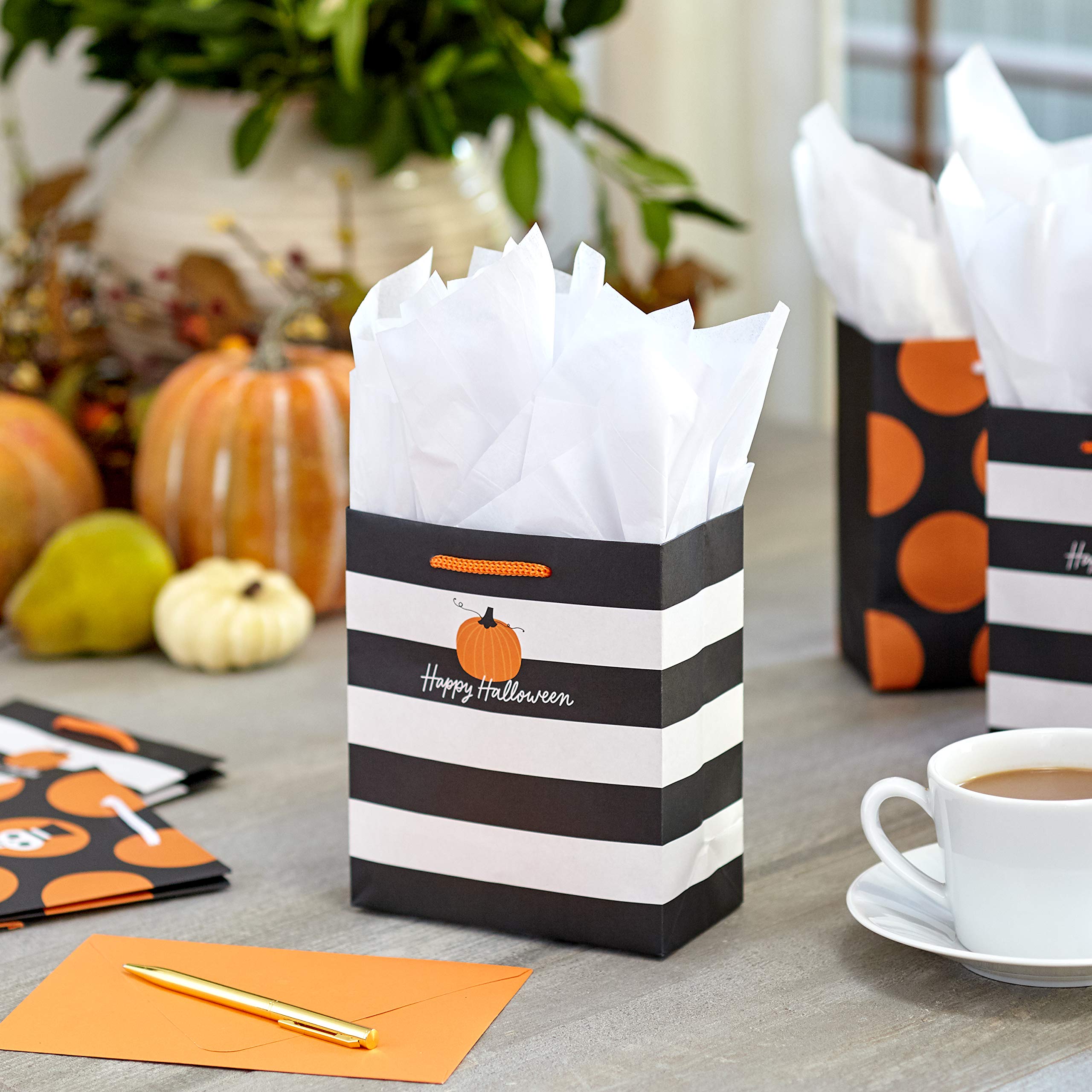 Hallmark Halloween Bag Bundle (8 Small Gift Bags, 2 Designs: Pumpkin and Stripes, Skull and Polka Dots) for Halloween Party Favors, Dinner Parties, Treats for Coworkers, Neighbors, Friends